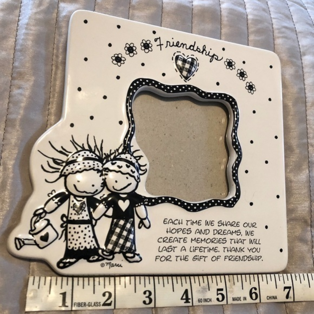 Friendship frame by Marci‎